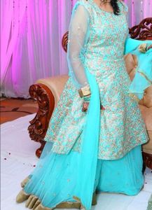 Elegant Cyan & Gold Embroidered gown
