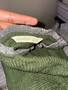 Green Ribbed Sweater with Ruffle Cuffs
