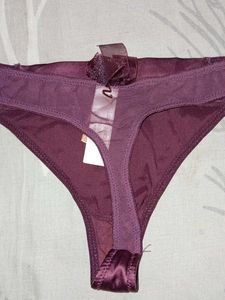 Elegant Thong with Sequins and Bow Detail
