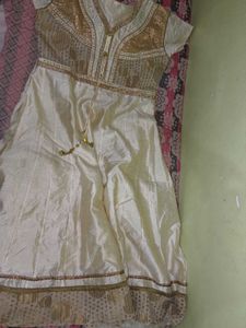 Elegant Cream Kurta Set with Gold Embellishments