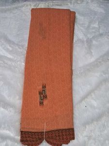 Elegant Orange Saree with Intricate Border without