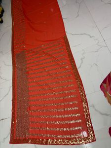 Vibrant Orange Sequined Saree