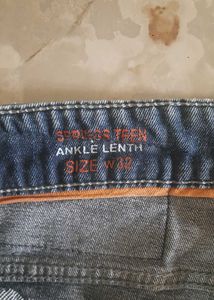 Distressed Blue Jeans
