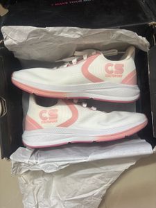 White and Pink Sports Shoes