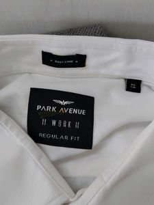 white branded shirt old but unused
