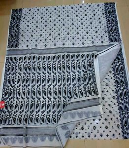 White Saree with Black Print