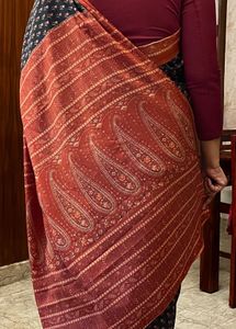 Elegant Black Saree with Orange Border