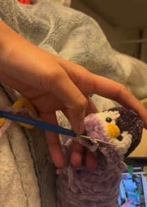 Crocheted Penguin Plushie as a bag charm keychain