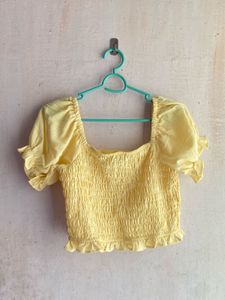 yellow crop top