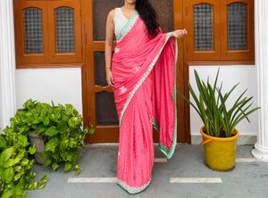Elegant Pink Saree with Embellished Border