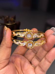 Elegant Gold Tone Bangles with Crystal Accents