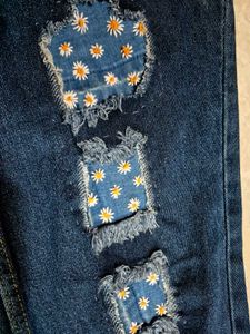 Daisy Patch Ripped Jeans