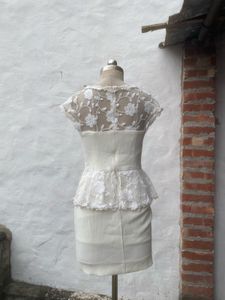 Elegant White Lace Peplum Gown