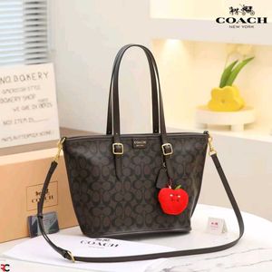 COACH* *TAXI TOTE BAG 21 IN SIGNATURE CANVAS*