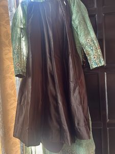 Elegant Green Kurta Set with Intricate Embellishme