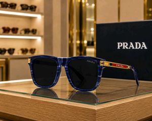 Prada Sunglasses - Black Frame