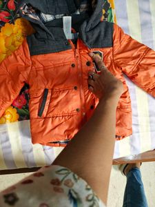 Orange Puffer Jacket with Grey Hood