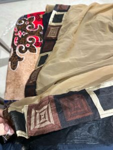 elegant brown and black clasical saree