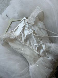 Elegant White Off-Shoulder Wedding Gown