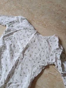 Elegant White Kurta with Embellished Neckline