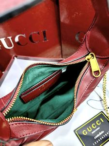 GUCCI* *GG MARMONT HALF-MOON-SHAPED MINI BAG*