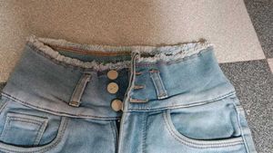 Light Wash Distressed Hem Jeans