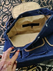 Denim Backpack with Star Embellishments