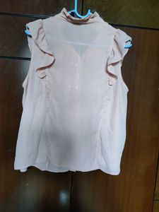Chic Pink Ruffled Sleeveless Blouse