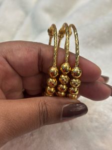 Elegant Gold Beaded Bangles
