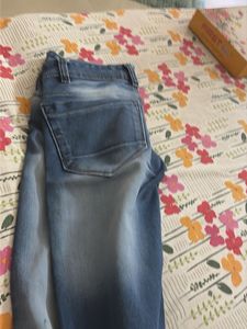 Distressed Blue Denim Jeans