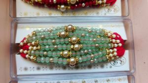 Elegant Red Beaded Rakhi 12 pc Set