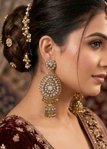 Stunning Golden Jhumka Earrings with White Stone