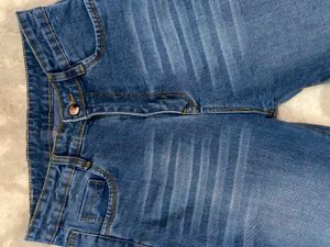 Minimalistic faded pale blue bootcut