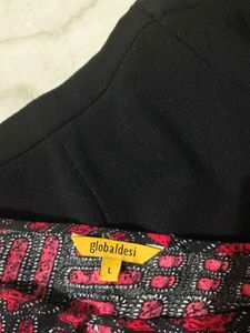 casual comfortable black trouser and cotton top.