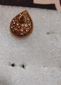 golden drop shape ring