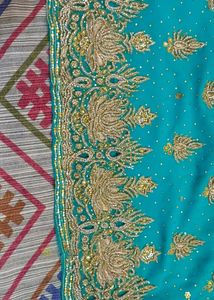 Exquisite Teal Saree with Intricate Gold Embellish