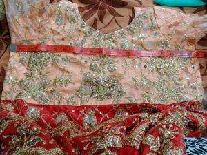 bridal gown peach and red colour