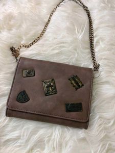 Brown crossbody bag with patches