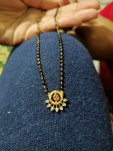 balck beads with Diamond and Ruby Pendant