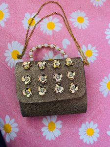 Sparkly Clutch with Floral Embellishments