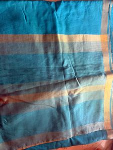 Beautiful Teal Saree with Gold Border