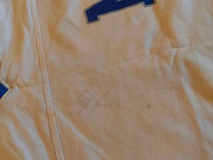 White T-Shirt with 'M' Graphic