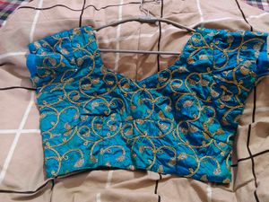 Designer Blue Embroidered Blouse  has margin