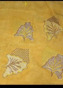 Elegant Yellow Saree with Leaf Motifs