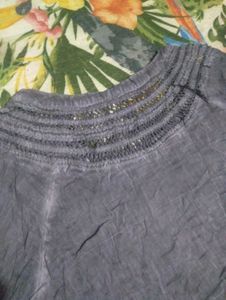 Elegant Blouse with Embellished Neckline