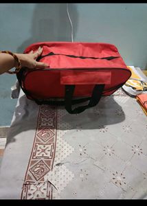 Red Alankar Jewellers Travel Bag