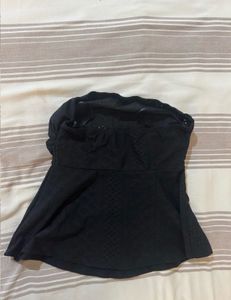 Two peplum  tops in black and white