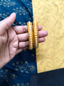 Elegant Pearl & Gold Bangles