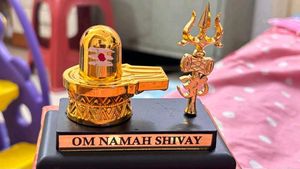Golden Shiva Lingam with Trident