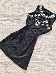 Small piece black mini dress